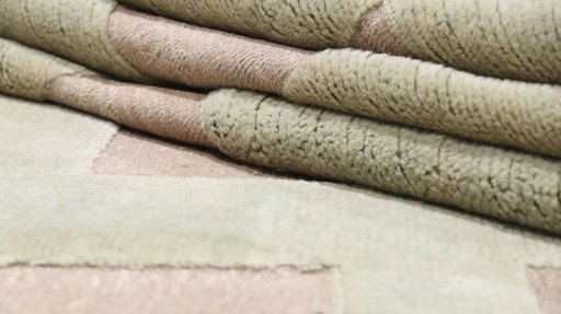Corner detail of New Kilim Gabbeh rug showing border pattern and Wool pile