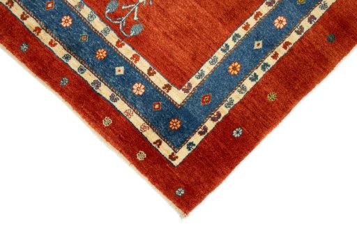 Backside of handmade New Persian Gabbeh rug showing knot structure and weave density