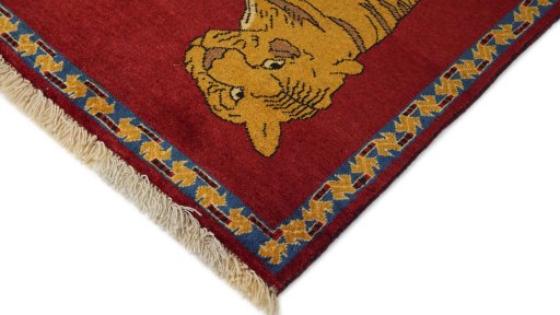 Backside of handmade 1980s Persian Gabbeh rug showing knot structure and weave density