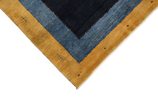 Backside of handmade New Persian Gabbeh rug showing knot structure and weave density