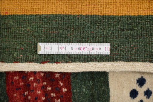 Corner detail of New Persian Gabbeh rug showing border pattern and Wool pile