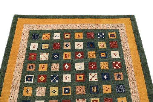 Backside of handmade New Persian Gabbeh rug showing knot structure and weave density