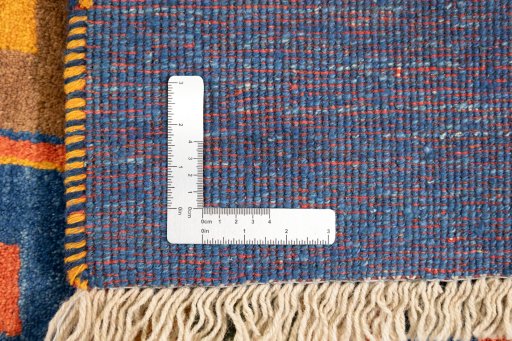 Close-up detail of 2000s Persian Gabbeh rug from Iran / Persia showing Wool weave