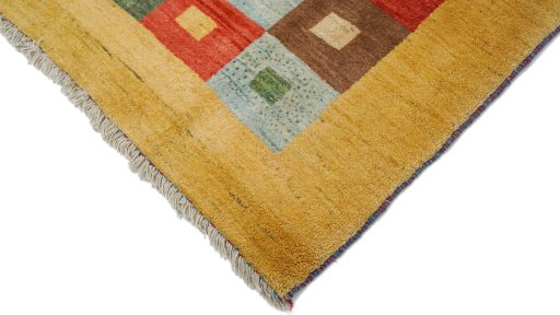 Backside of handmade New Persian Gabbeh rug showing knot structure and weave density