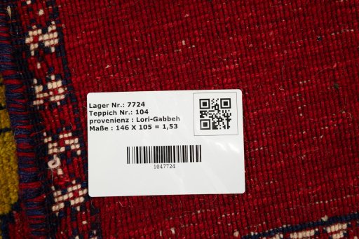 Corner detail of New Persian Gabbeh rug showing border pattern and Wool pile