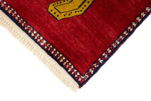 Backside of handmade New Persian Gabbeh rug showing knot structure and weave density