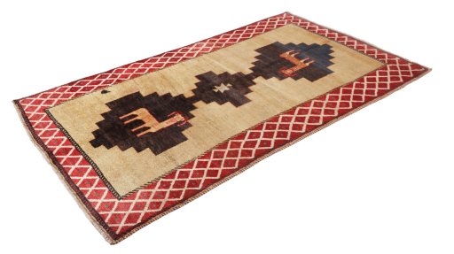 Corner detail of 1920s Persian Gabbeh rug showing border pattern and Wool pile