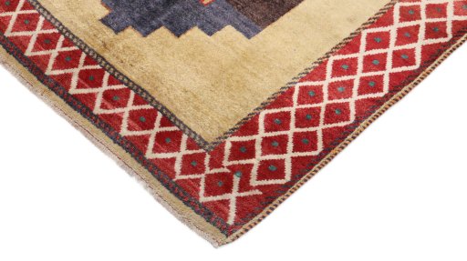 Backside of handmade 1920s Persian Gabbeh rug showing knot structure and weave density
