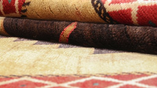 Close-up detail of 1920s Persian Gabbeh rug from Iran / Persia showing Wool weave