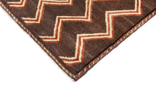 Backside of handmade New Persian Gabbeh rug showing knot structure and weave density