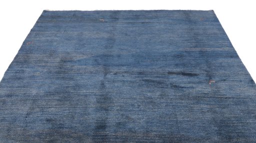 Surface texture of 1980s Persian Gabbeh rug with natural Wool and intricate pattern