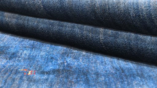 Close-up detail of 1980s Persian Gabbeh rug from Iran / Persia showing Wool weave
