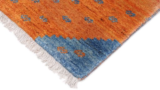 Backside of handmade New Persian Gabbeh rug showing knot structure and weave density