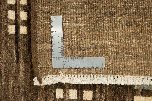 Full view of 1980s Persian Gabbeh rug from Afghanistan, 361 × 277 cm in Brown tones