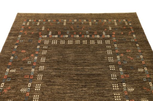 Surface texture of 1980s Persian Gabbeh rug with natural Wool and intricate pattern