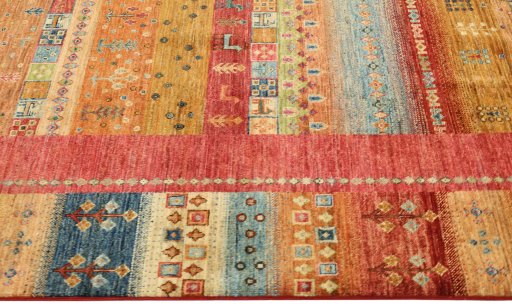Corner detail of New Persian Gabbeh rug showing border pattern and Wool pile
