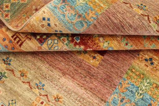 Corner detail of New Persian Gabbeh rug showing border pattern and Wool pile