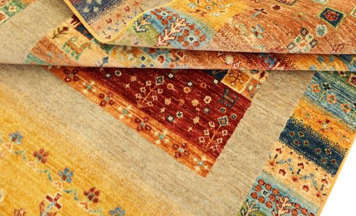 Corner detail of New Persian Gabbeh rug showing border pattern and Wool pile