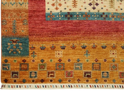 Corner detail of New Persian Gabbeh rug showing border pattern and Wool pile