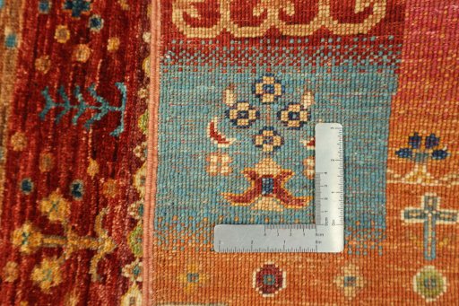 Backside of handmade New Persian Gabbeh rug showing knot structure and weave density