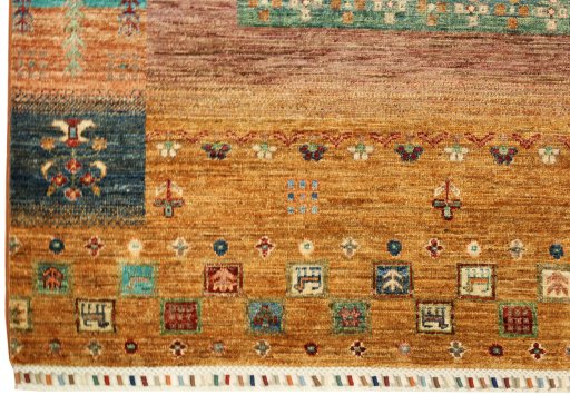 Corner detail of New Persian Gabbeh rug showing border pattern and Wool pile