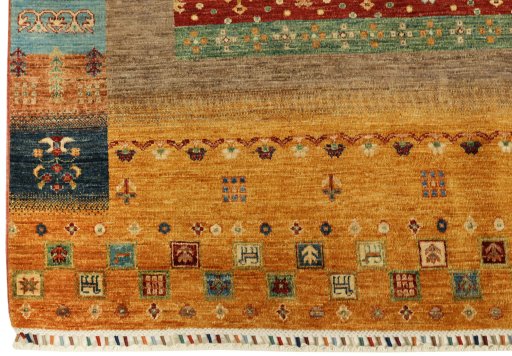 Corner detail of New Persian Gabbeh rug showing border pattern and Wool pile