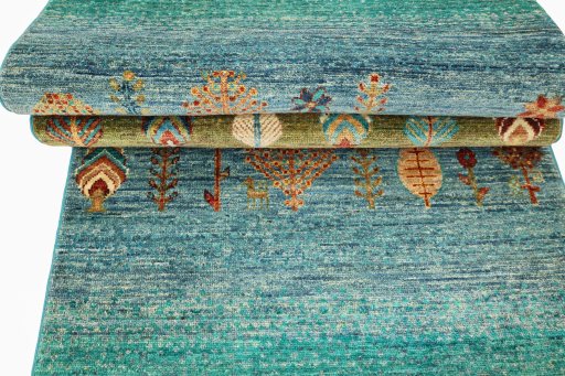 Corner detail of New Persian Gabbeh rug showing border pattern and Wool pile