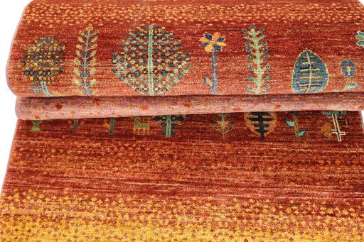 Corner detail of New Persian Gabbeh rug showing border pattern and Wool pile