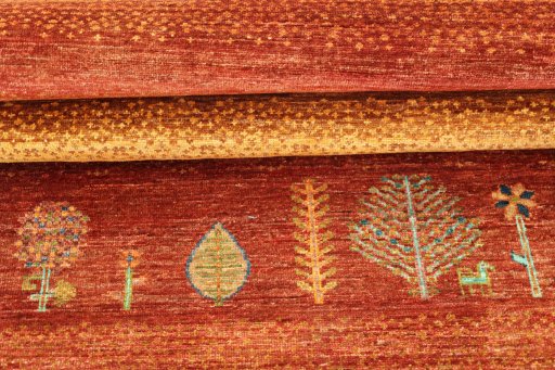 Corner detail of New Persian Gabbeh rug showing border pattern and Wool pile