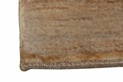 Backside of handmade New Persian Gabbeh rug showing knot structure and weave density