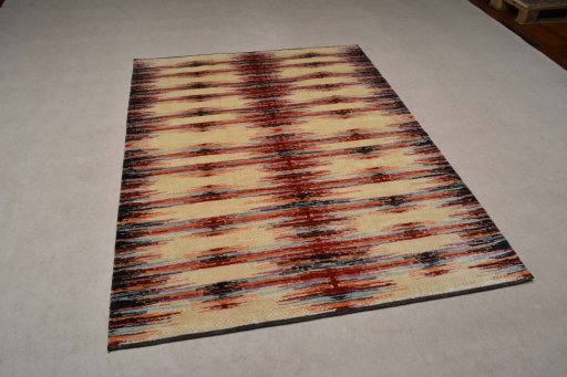 Corner detail of New Persian Gabbeh rug showing border pattern and Wool pile