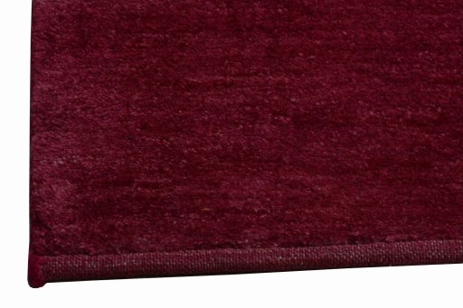 Backside of handmade New Persian Gabbeh rug showing knot structure and weave density