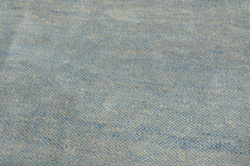 Backside of handmade New Persian Gabbeh rug showing knot structure and weave density