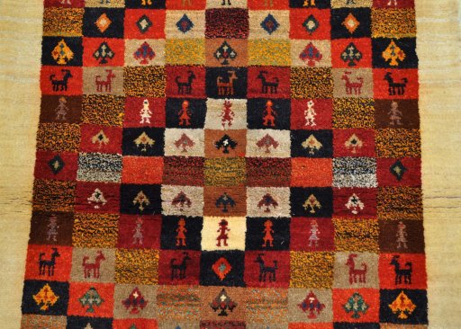Close-up detail of 2000s Persian Gabbeh rug from Iran / Persia showing Wool weave