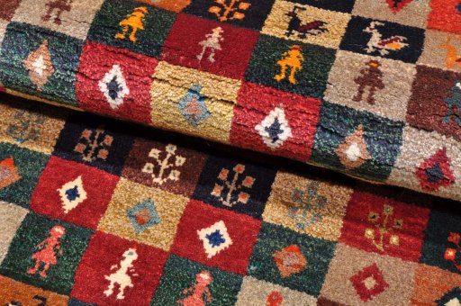 Central medallion detail of 2000s Persian Gabbeh rug from Iran / Persia