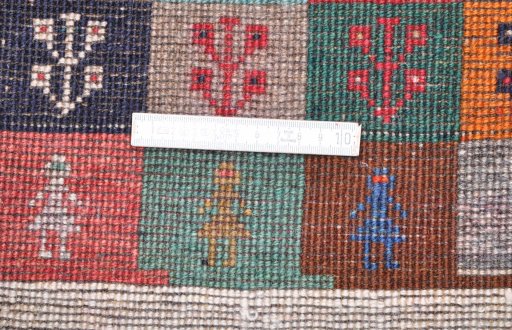 Close-up detail of 2000s Persian Gabbeh rug from Iran / Persia showing Wool weave