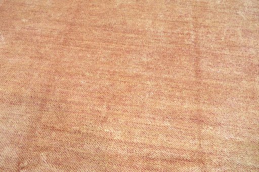 Backside of handmade New Persian Gabbeh rug showing knot structure and weave density