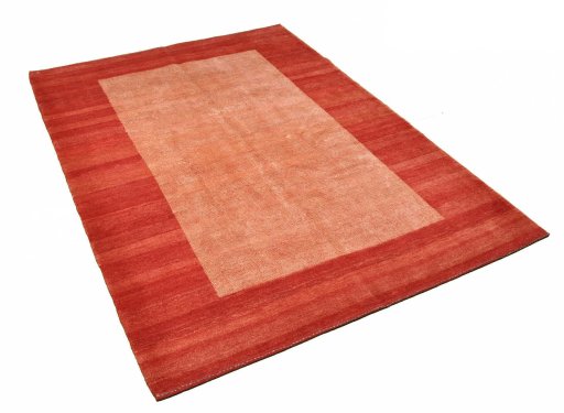 Corner detail of New Persian Gabbeh rug showing border pattern and Wool pile