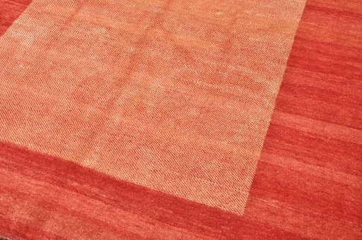 Backside of handmade New Persian Gabbeh rug showing knot structure and weave density