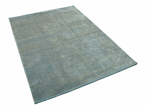 Corner detail of New Persian Gabbeh rug showing border pattern and Wool pile