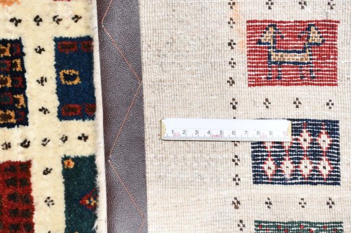 Close-up detail of 2000s Persian Gabbeh rug from Iran / Persia showing Wool weave