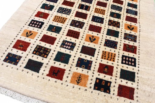 Central medallion detail of 2000s Persian Gabbeh rug from Iran / Persia