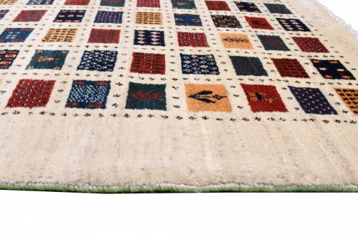 Close-up detail of 2000s Persian Gabbeh rug from Iran / Persia showing Wool weave