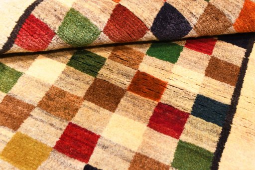 Full view of 2000s Persian Gabbeh rug from Iran / Persia, 175 × 94 cm in Multi Color tones