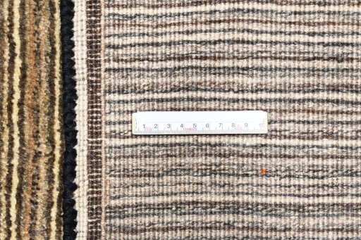 Close-up detail of 2000s Persian Gabbeh rug from Iran / Persia showing Wool weave