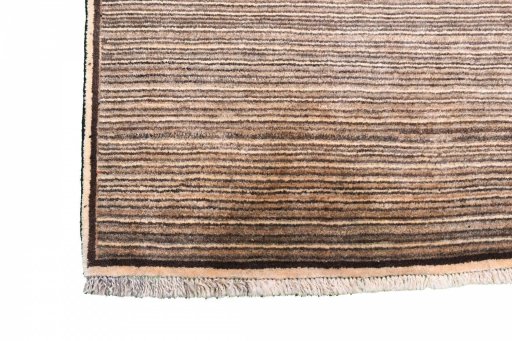 Full view of 2000s Persian Gabbeh rug from Iran / Persia, 225 × 125 cm in Beige tones