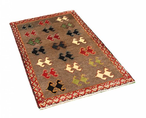 Corner detail of 2000s Persian Gabbeh rug showing border pattern and Wool pile