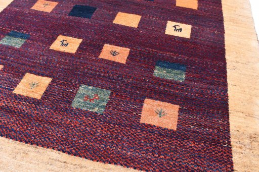 Central medallion detail of 2000s Persian Gabbeh rug from Iran / Persia