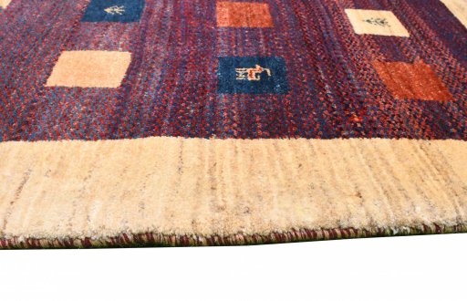 Close-up detail of 2000s Persian Gabbeh rug from Iran / Persia showing Wool weave