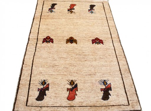 Surface texture of 2000s Persian Gabbeh rug with natural Wool and intricate pattern